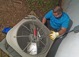 tech working on ac system