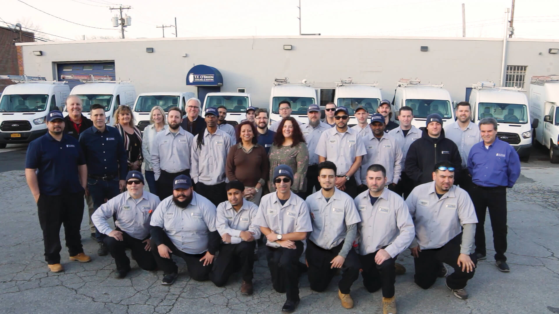 group shot of the TF O'brien team posing in rows