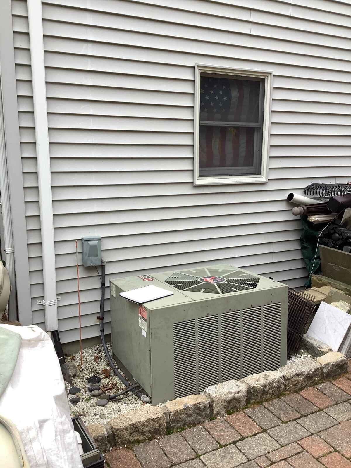 Old AC unit before replacement