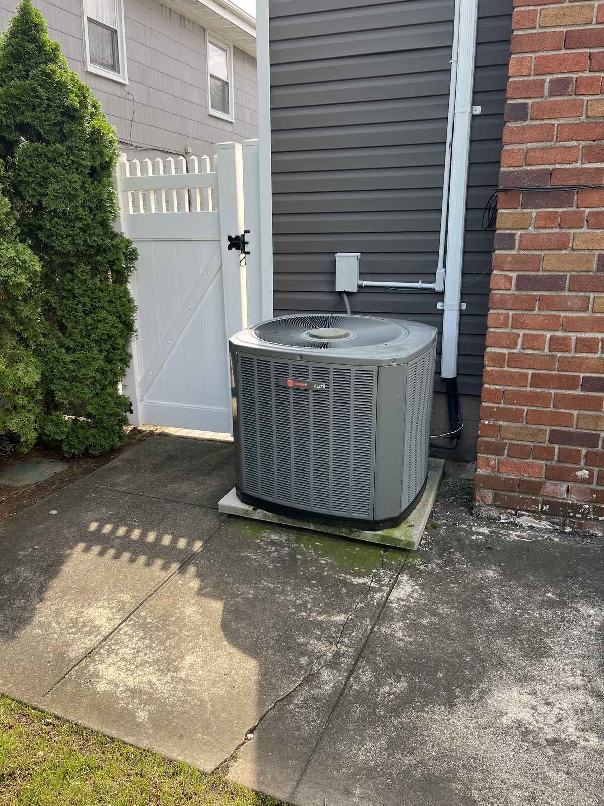 Outdoor AC unit before replacement