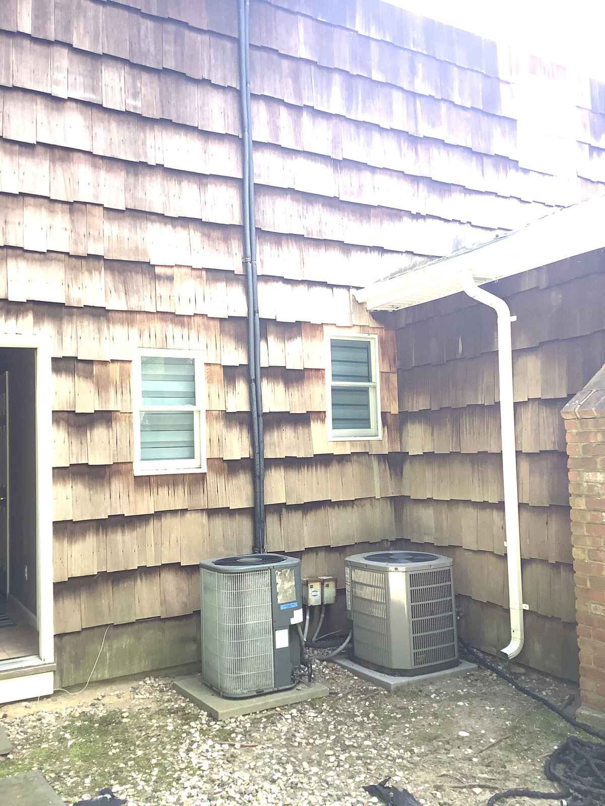 Before picture of an outdoor AC system