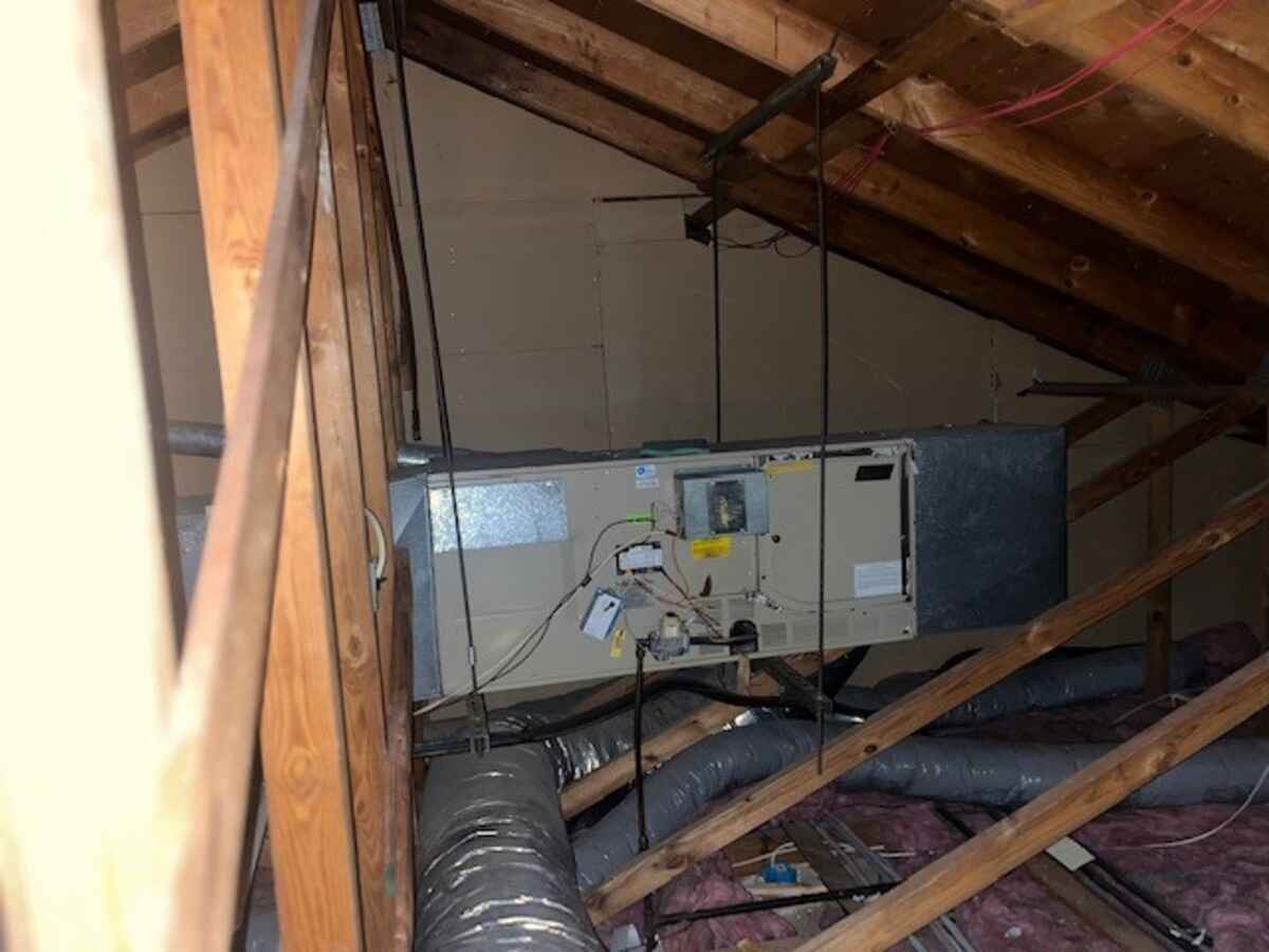 Before replacing a furnace in an attic
