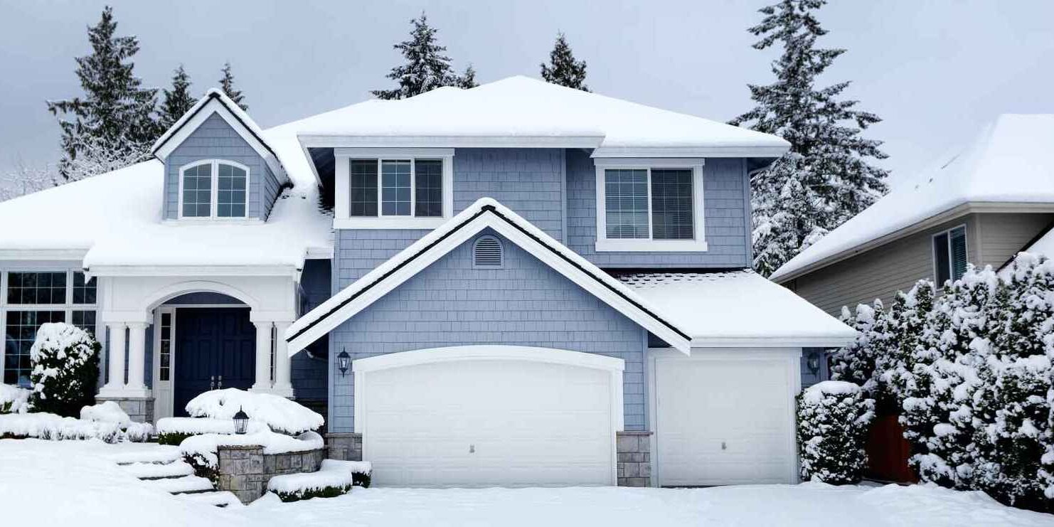 Home covered with snow